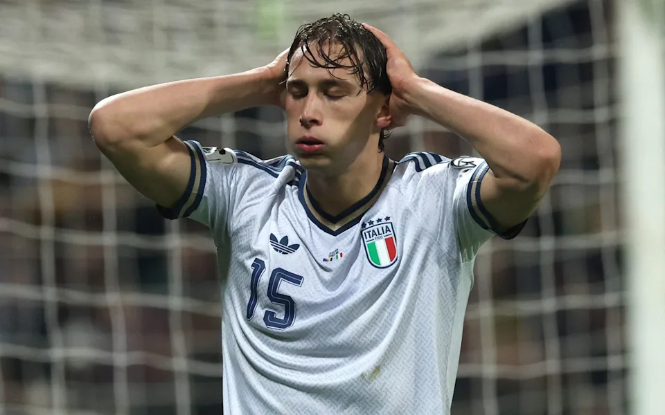 A dejected Italian player after their World Cup play-off defeat