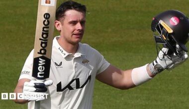 Jamie Smith celebrates scoring a century