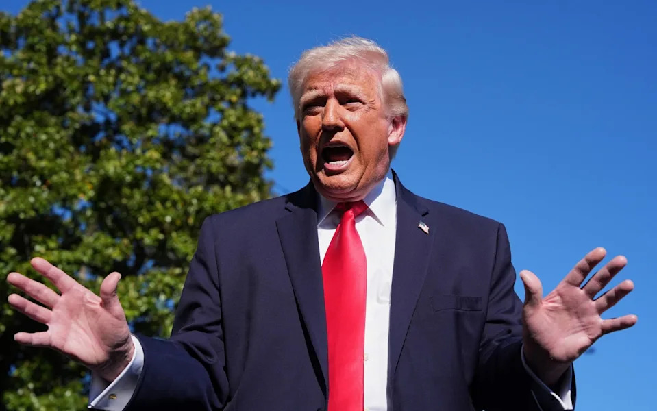 Donald Trump said the US Navy would begin stopping 'any and all ships trying to enter or leave the Strait of Hormuz'