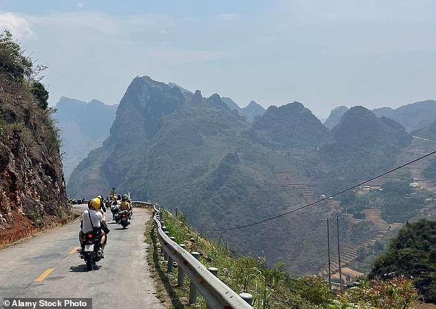 Motorcyclists are seen riding along the Ha Giang Loop in Vietnam (file picture)