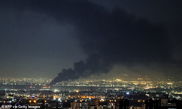 Smoke rises from the site of a US-Israeli strike on the Iranian capital Tehran on April 7