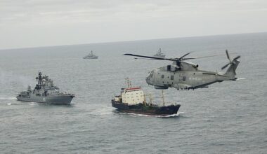 The Royal Navy will be forced to ask the French for help intercepting Russian vessels in British waters because the UK fleet is struggling to meet 'operational commitments', sources say. Pictured: HMS Somerset, HMS St Albans and a Merlin helicopter track a Russian vessel
