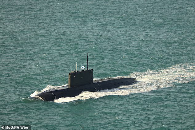 The MoD has denied it needs French help to protect British waters. Pictured: A submarine bearing the ensign of the Russian navy