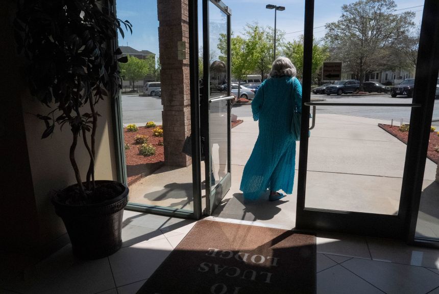 Lucas leaves her office after talking about redistricting.