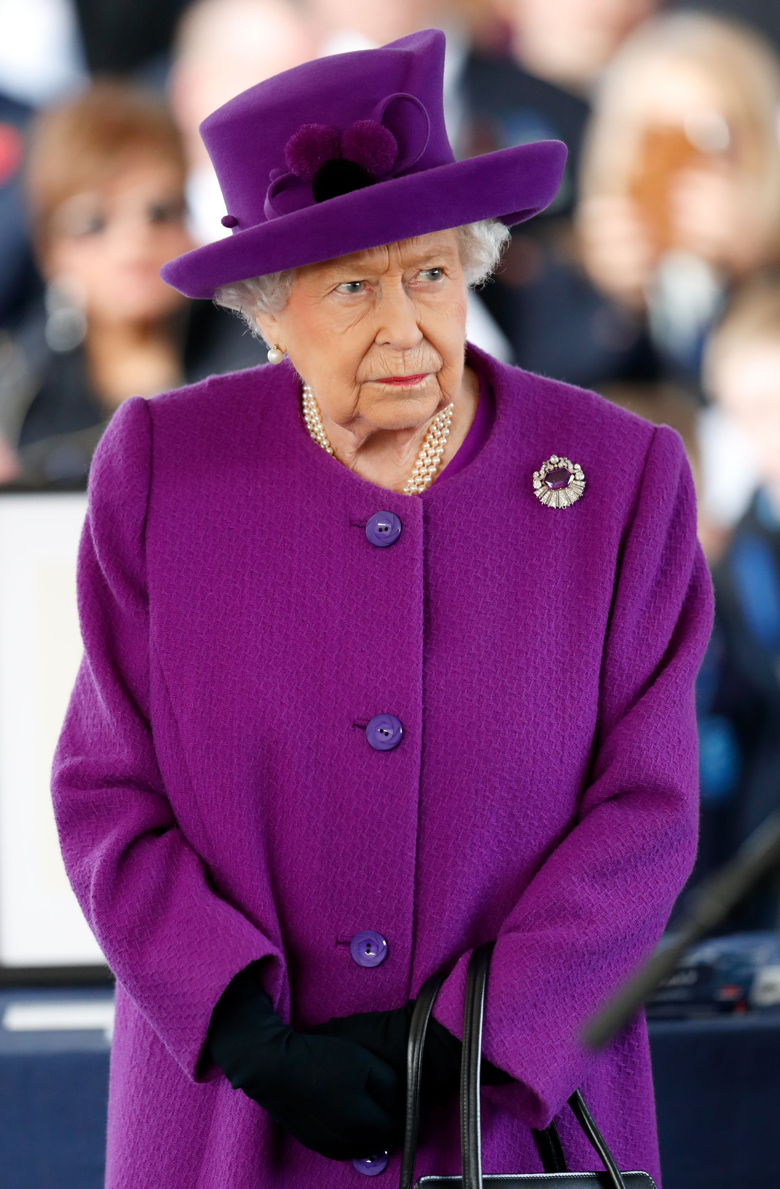 Image may contain Elizabeth II Person Adult Clothing Hat Child Face and Head