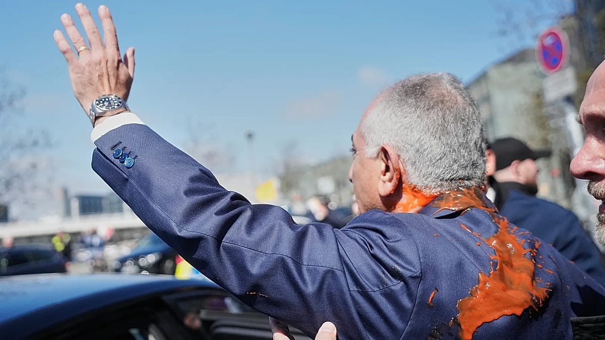 Iran's exiled crown prince Reza Pahlavi splattered with red liquid in Berlin