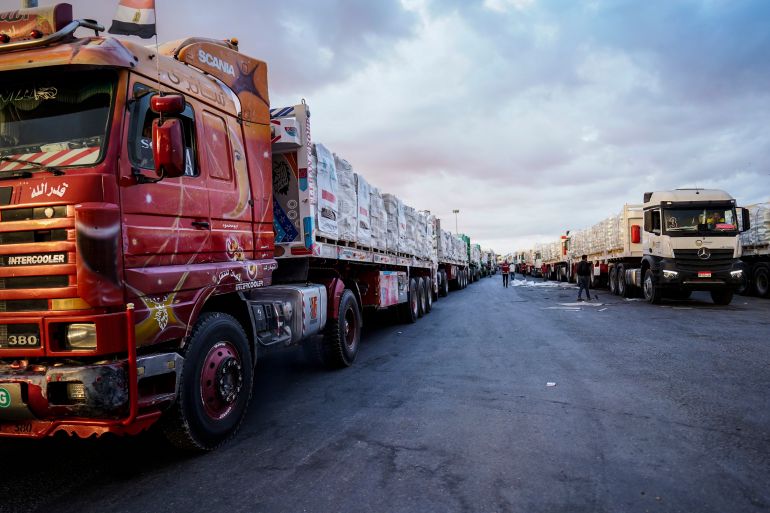 epa12447996 Humanitarian aid trucks are lined up before proceeding towards the Rafah border crossing, between Egypt and the Gaza Strip, in Rafah, North Sinai, Egypt, 12 October 2025. An increase of the number of trucks loaded with humanitarian aid were allowed into the Gaza Strip as part of the ceasefire agreement between Israel and Hamas, and ahead of the scheduled October 13th Sharm El-Sheikh Peace Summit to end the conflict in Gaza. EPA/STRINGER