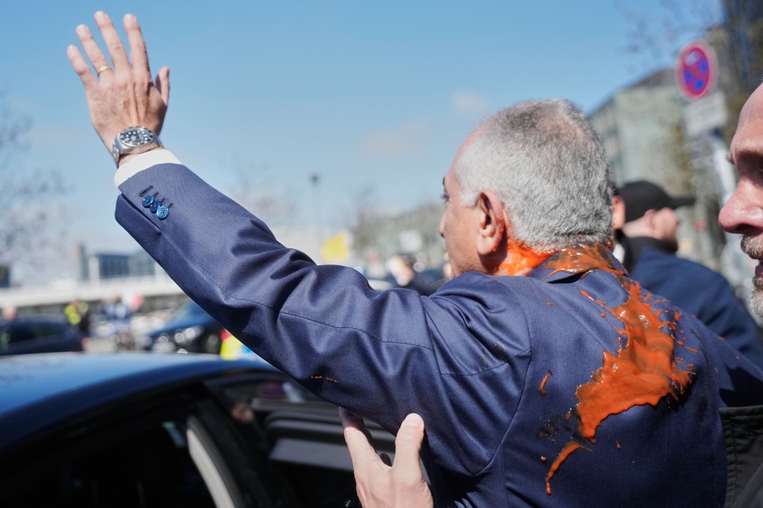 Iran's Exiled Crown Prince Splattered With Red Liquid