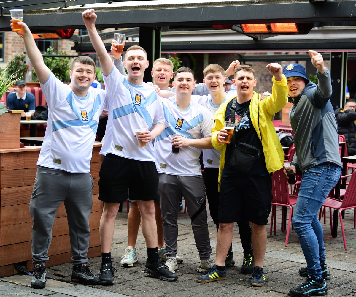 Scotland fans enjoying a beer in Concert Square