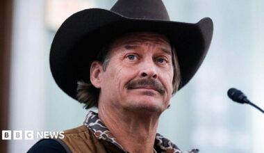 Kid Rock is seen wearing a cowboy hat