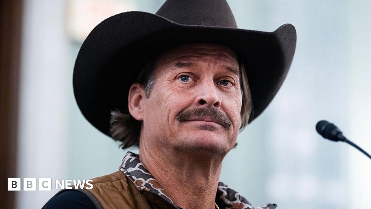 Kid Rock is seen wearing a cowboy hat