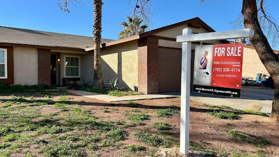 A “For Sale” sign is shown outside a home in Southern Nevada. 