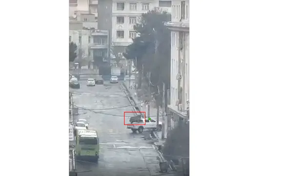  In Shahriar, west of Tehran, footage sent to Iran International on March 13 showed a Toyota pickup truck arriving at Al-Zahra High School carrying what appeared to be a machine gun concealed under a tarp.