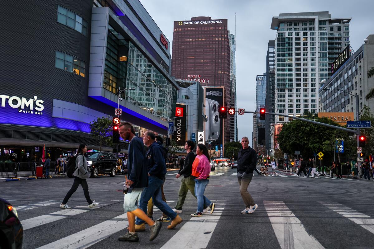 The depressed office market in downtown Los Angeles has some renters looking to buy their own buildings.