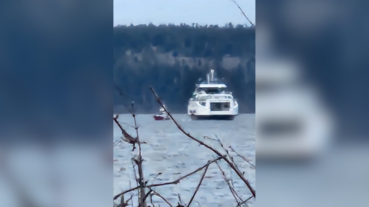 Coast guard and BC Ferries boat in the ocean near Texada Island 