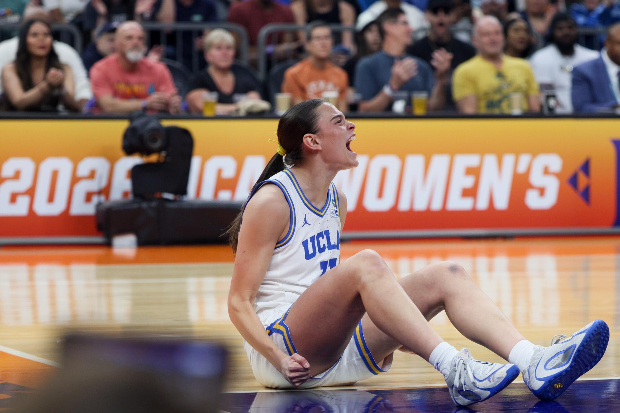 UCLA's Gabriela Jaquez celebrates after scoring while being fouled in the first quarter against South Carolina on Sunday.