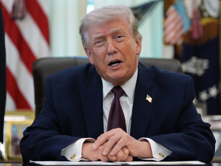 President Donald Trump speaks in the Oval Office of the White House before signing an executive order Tuesday, March 31, 2026, in Washington.