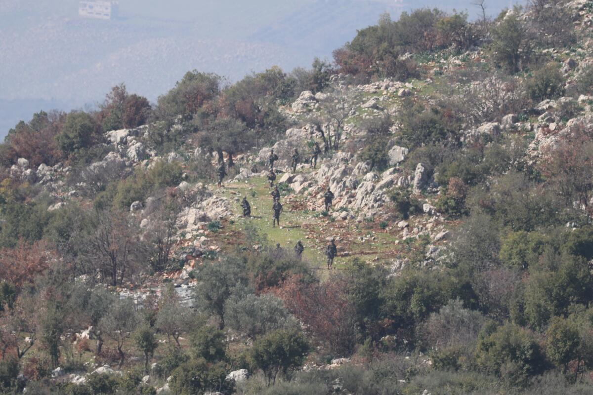 Israeli soldiers patrol a rural area in southern Lebanon.