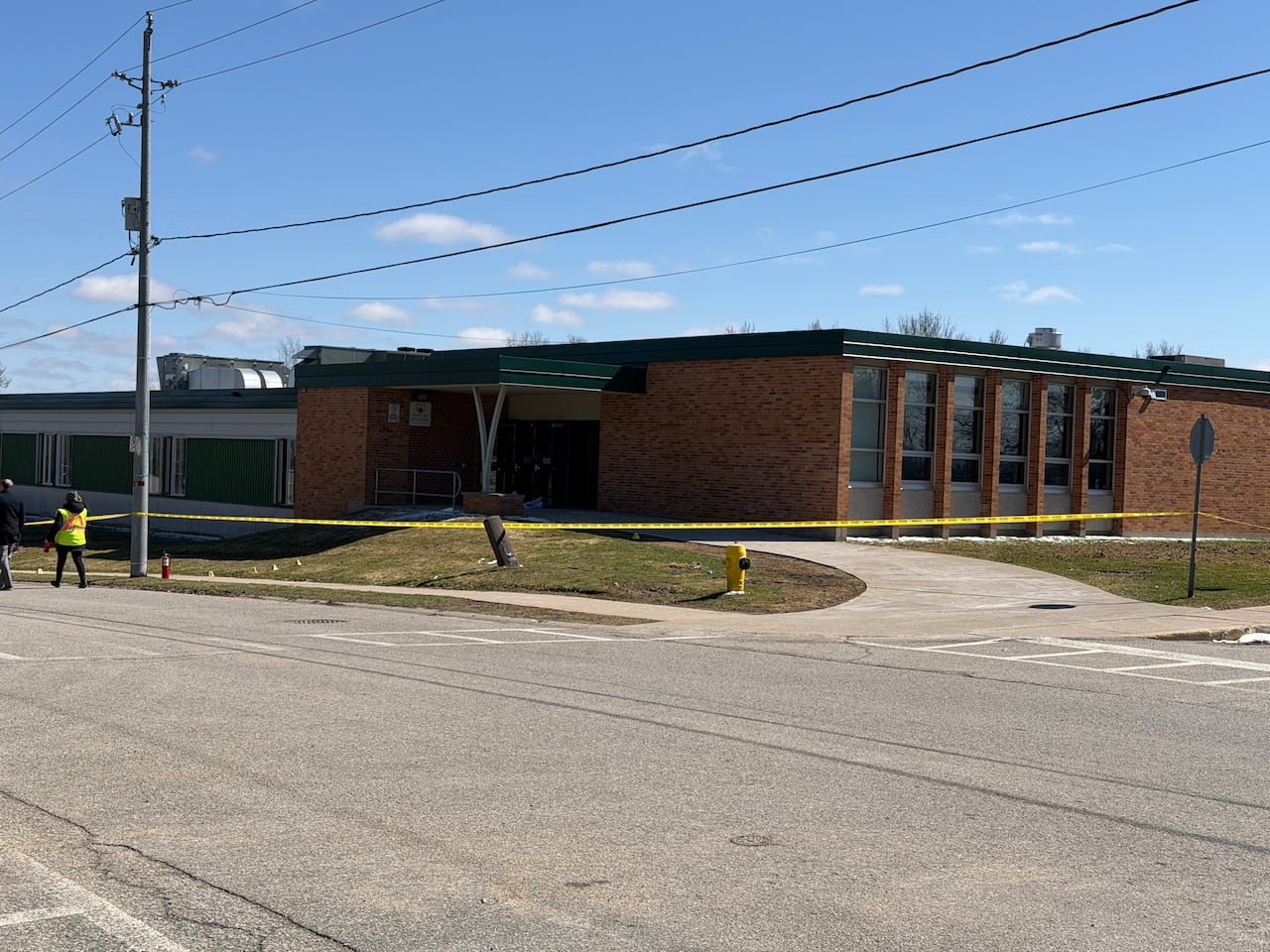 Police tape around a school