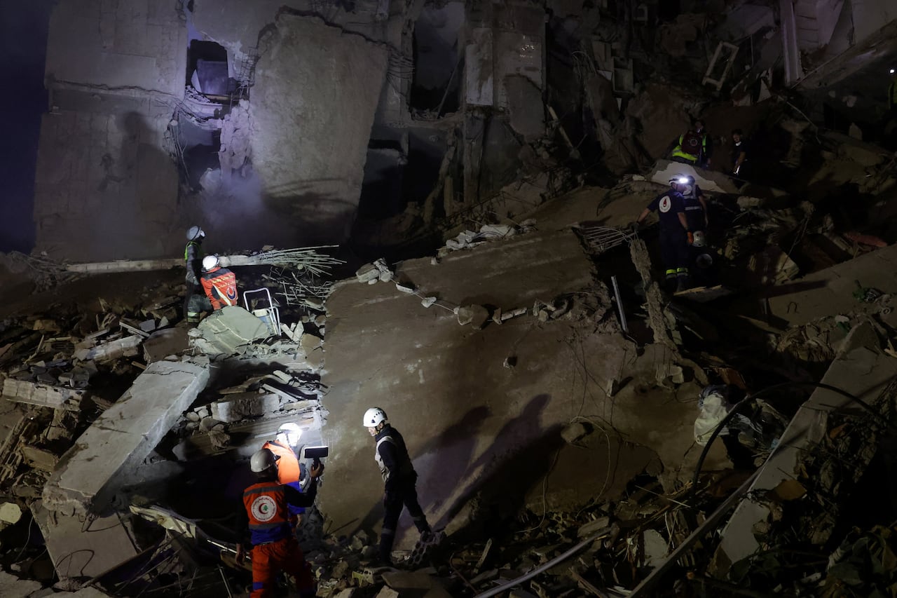 Rescuers work at the site of an Israeli strike, in Beirut, Lebanon, April 8, 2026.  