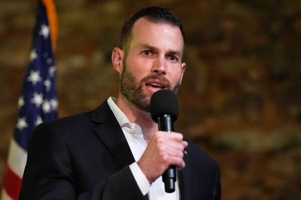 Republican Clay Fuller speaks during an election night watch party after winning a special election for Georgia's 14th Congressional District, Tuesday, April 7, 2026, in Ringgold, Ga. (AP Photo/Mike Stewart)