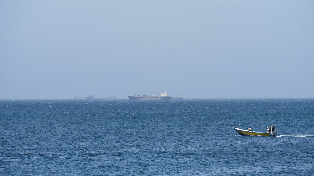 Vessels and boats are off the coast of Musandam governorate, overlooking the strait of Hormuz, in Musandam governance, in Oman, on Wednesday.
