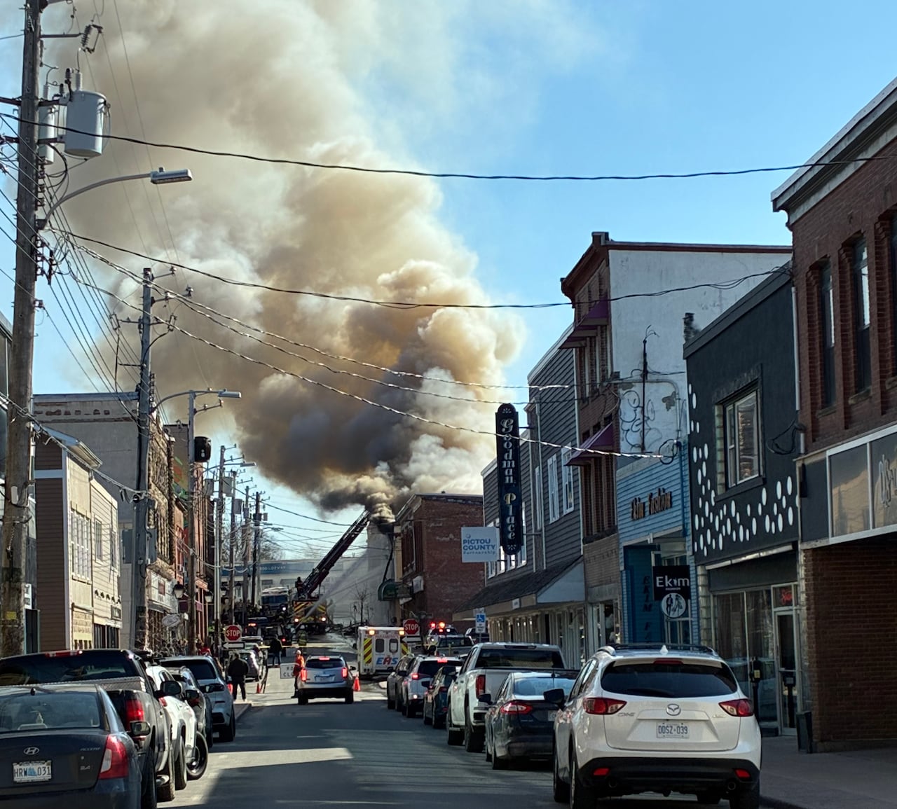 smoke pours out from a building