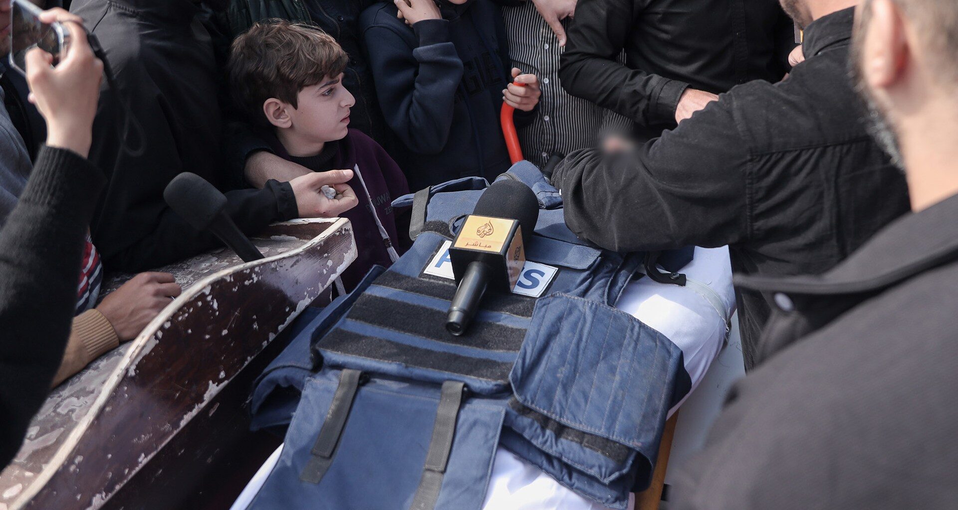 Al Jazeera’s Mohammed Wishah, killed by Israeli strike, laid to rest | Israel-Palestine conflict