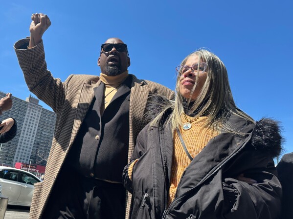 Gretchen Soto, mother of Eric Duprey, and Black Lives Matter advocate Hawk Newsome are seen outside court following the sentencing of former New York City police sergeant Erik Duran at the Bronx County Hall of Justice Thursday, April 9, 2026, New York. (AP Photo/Michael R. Sisak)