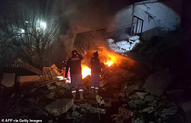 First responders look for survivors at the site of an Israeli airstrike that targeted the southern Lebanese village of Choukine on April 9, 2026. A Hezbollah lawmaker on April 9 reiterated his group's rejection of any direct negotiations between Lebanon and Israel, after Israeli Prime Minister Benjamin Netanyahu said he had ordered his cabinet to begin talks with Beirut. (Photo by Abbas FAKIH / AFP via Getty Images)