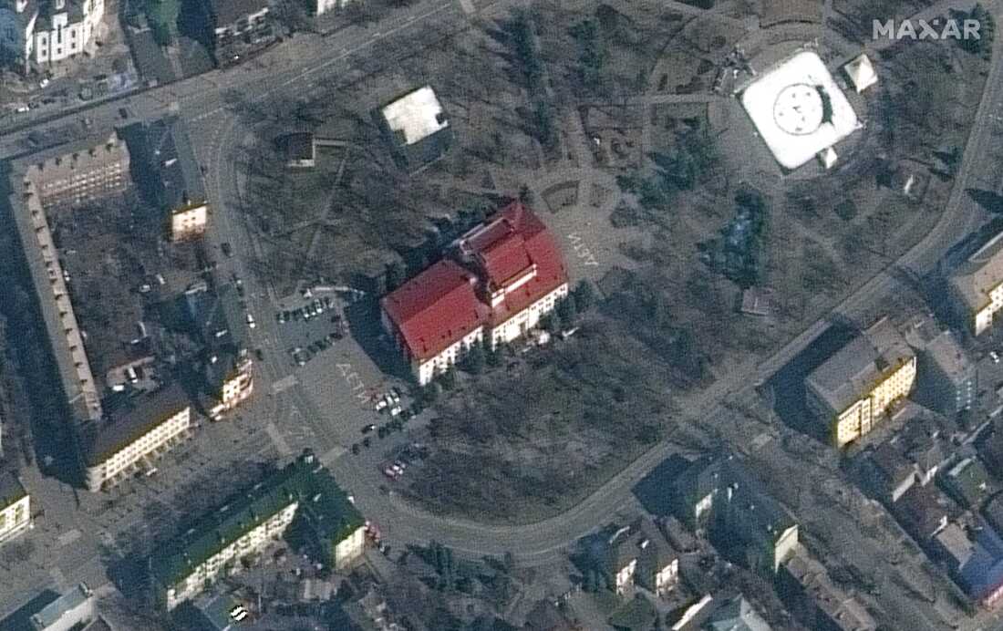 Satellite imagery of Mariupol, Ukraine that included the Mariupol Drama Theater, the word children is written in large white letters (in Russian) in front of and behind the theater on March 14, 2022. The building had been used as a shelter for hundreds of Ukrainian civilians. It was bombed two days later.