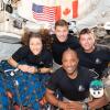 The Artemis II crew — Christina Koch (left), Jeremy Hansen, Victor Glover and Reid Wiseman — have to share tight quarters aboard the Orion spacecraft on their way home. But even with limited space, they can still get a solid workout in — thanks to a very special piece of equipment.