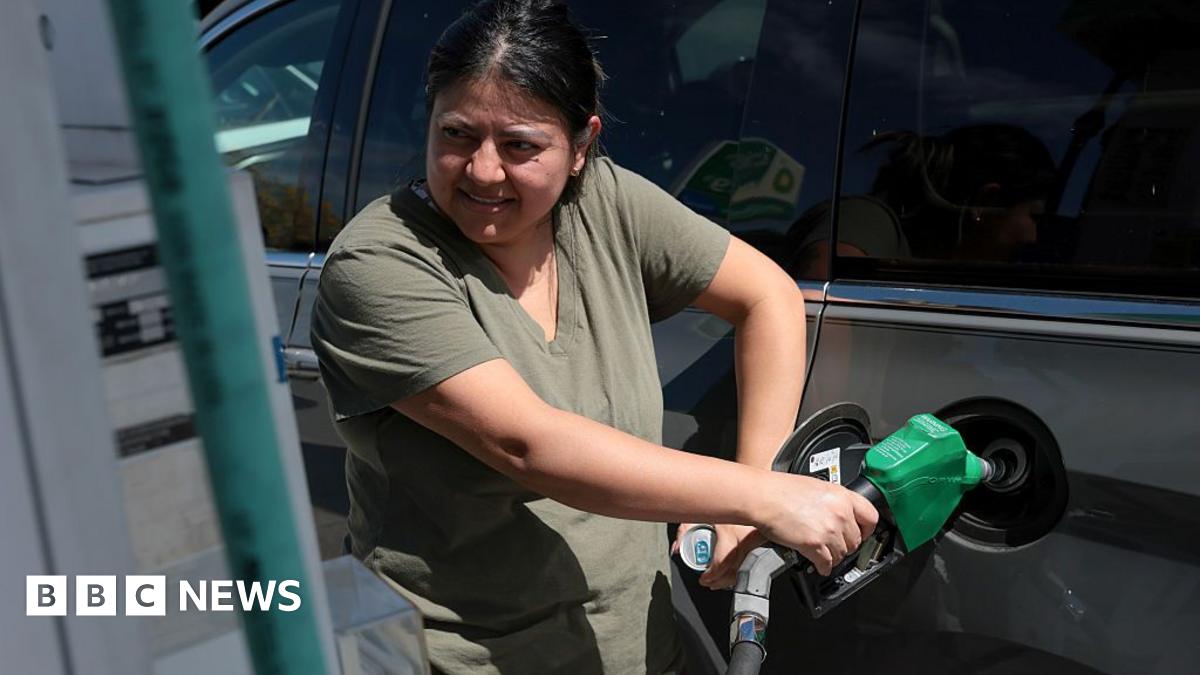 Vilma Jaime puts fuel in her vehicle at a gas station on April 06, 2026 in Miami, Florida. Florida gas prices have risen to over $4 per gallon in early April 2026 as the war in Iran has affected global oil supplies, leading to higher crude oil costs.