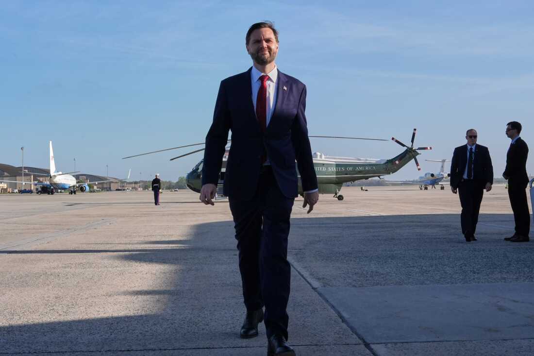 Vice President JD Vance walks to speak with the Press before boarding Air Force Two, Friday, April 10, 2026, at Joint Base Andrews, Md., for expected departure to Pakistan, for talks on Iran.