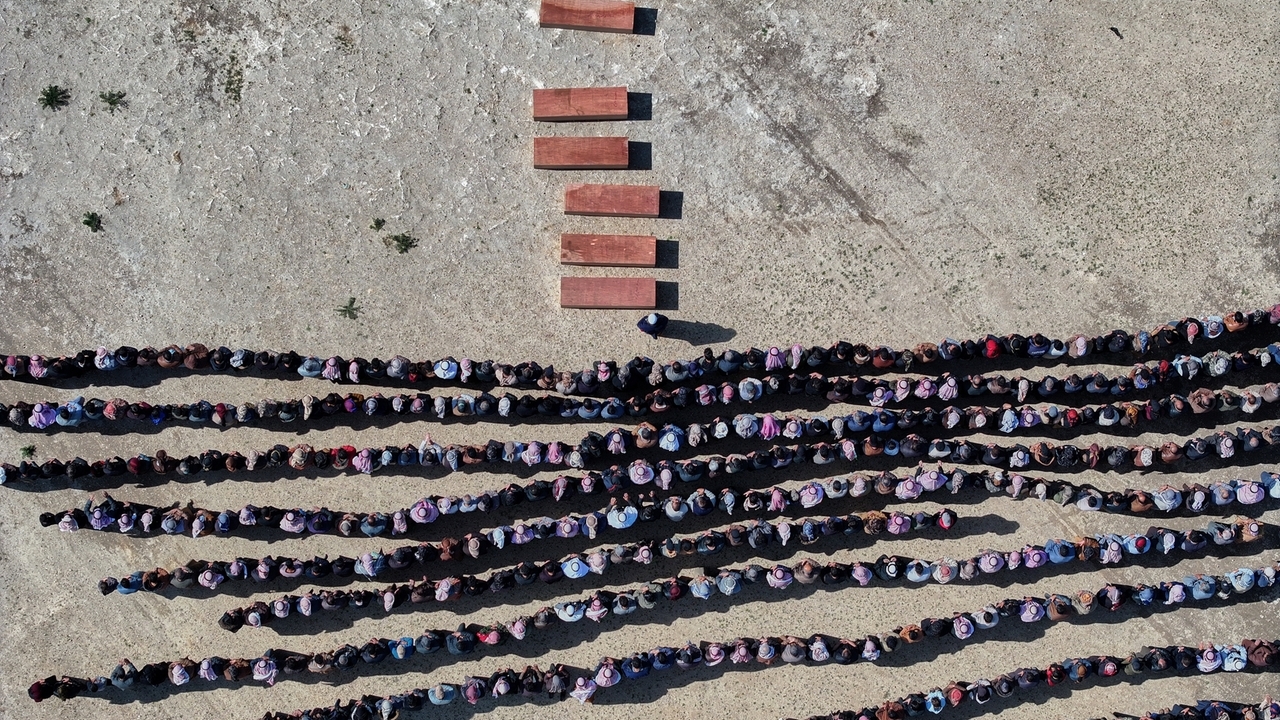 A Syrian man buries his wife and 4 children killed in Israeli strikes on Beirut