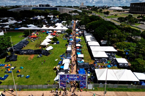 The "Acampamento Terra Livre," or Free Land Encampment, Brazil's largest annual Indigenous mobilization that focuses on land rights and environmental protection, stands in Brasilia, Brazil, Monday, April 6, 2026. (AP Photo/Eraldo Peres)