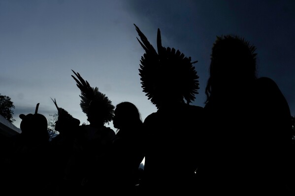 Kayapo people gather at the Acampamento Terra Livre, an Indigenous mobilization event focused on land rights and environmental protection, in Brasilia, Brazil, Sunday, April 5, 2026. (AP Photo/Eraldo Peres)