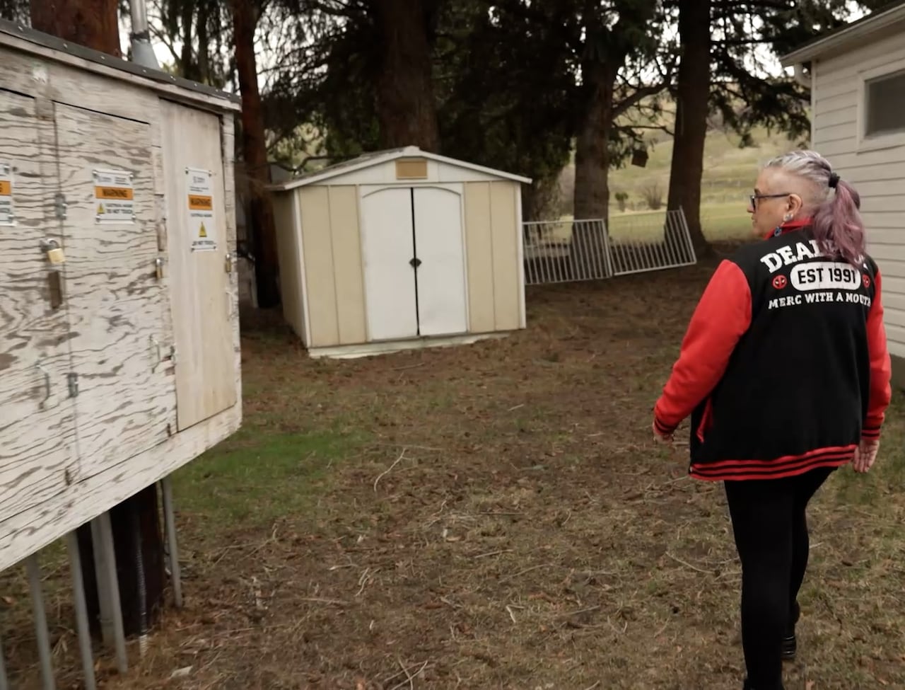 woman and electrical boxed