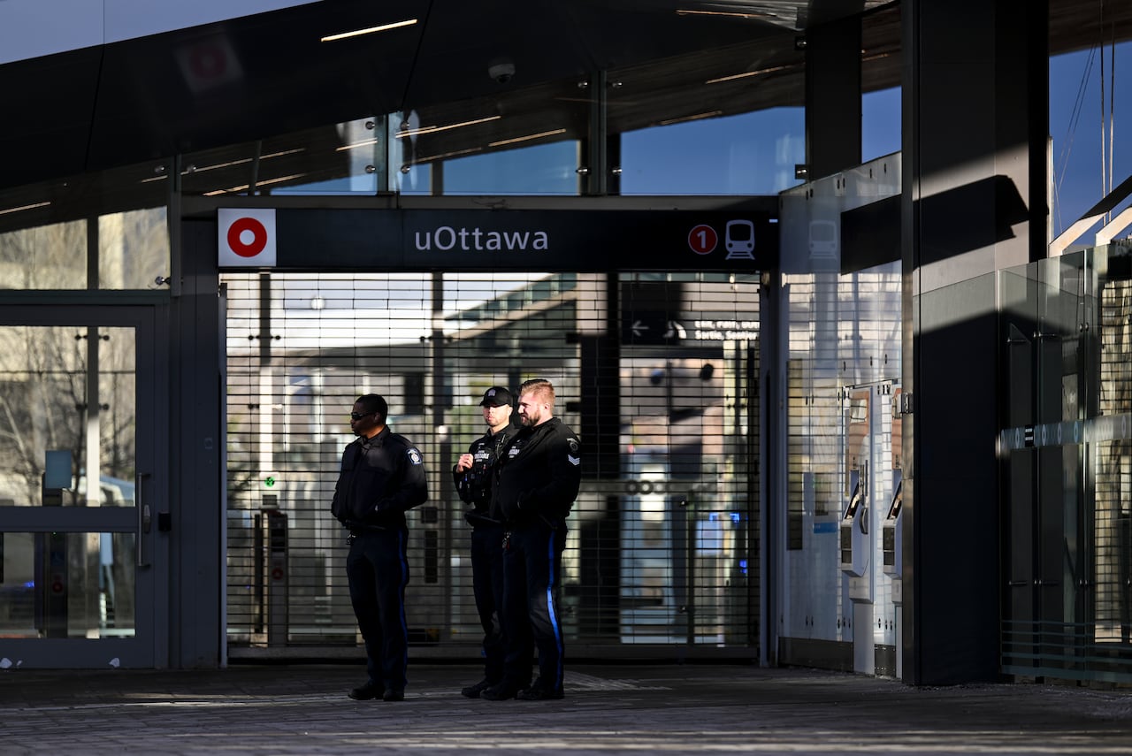 Ottawa police special constables outside the uOttawa LRT station.