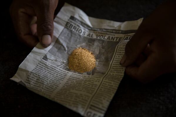 Gold collected after a day of work is ready to be weighed at a mining camp in Madre de Dios, Peru, April 5, 2019. (AP Photo/Rodrigo Abd, File)