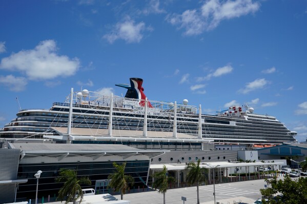 Carnival Cruise Line's Carnival Horizon cruise ship is shown docked at PortMiami, April 9, 2021, in Miami. (AP Photo/Wilfredo Lee, File)