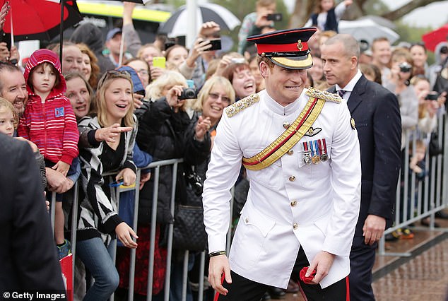 CANBERRA, AUSTRALIA - APRIL 06:  Prince Harry visits with members of the public outside the Australian War Memorial on April 6, 2015 in Canberra, Australia. Prince Harry, or Captain Wales as he is known in the British Army, will end his military career with a month long secondment to the Australian Defence Force in barracks in Sydney, Perth and Darwin.  (Photo by Stefan Postles/Getty Images) 15733681