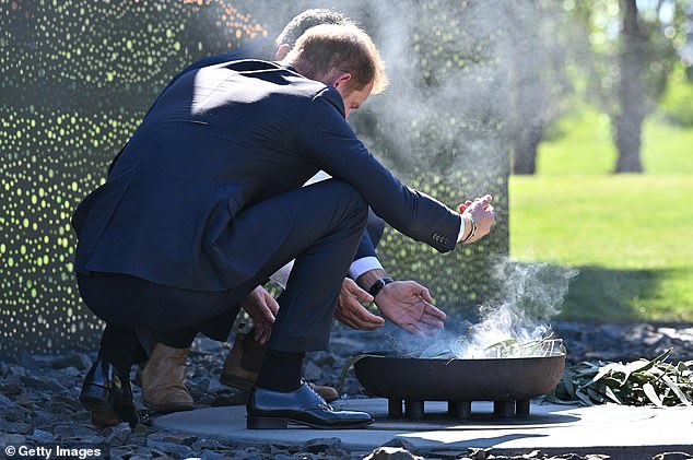 CANBERRA, AUSTRALIA - APRIL 15: Prince Harry, Duke of Sussex and LTCOL Joseph West lay a wreath and participate in a Smoking Ceremony during a visit to The Australian War Memorial on April 15, 2026 in Canberra, Australia. The Duke and Duchess of Sussex are on a four-day visit to Australia, with engagements across Melbourne, Canberra and Sydney. (Photo by Wendell Teodoro/Getty Images)