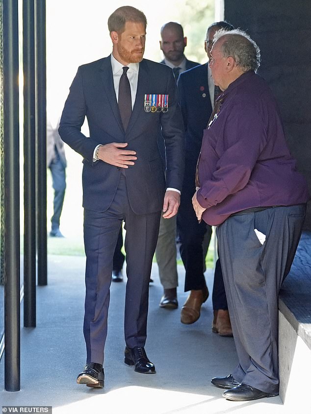 Britain's Prince Harry, the Duke of Sussex views the Australian War Memorial with Indigenous veteran Michael Bell in Campbell, Canberra, on day two of the royal trip to Australia, April 15, 2026.    Jonathan Brady/Pool via REUTERS