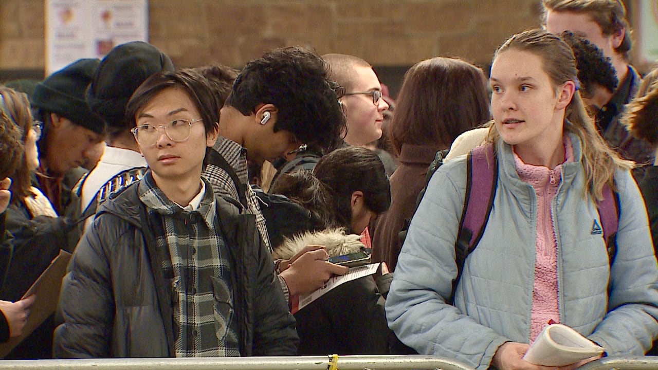 Two young people looking at their surroundings