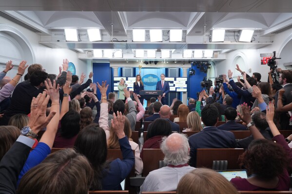 White House press secretary Karoline Leavitt , Small Business Administration administrator Kelly Loeffler and Treasury Secretary Scott Bessent speak with reporters in the James Brady Press Briefing Room at the White House, Wednesday, April 15, 2026, in Washington. (AP Photo/Alex Brandon)