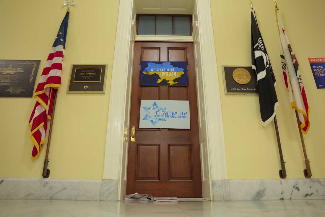 A name plate hangs outside the office of Rep. Eric Swalwell, D-Calif., in Cannon House Office Building on April 14. Swalwell announced Monday that he would resign amid allegations of sexual misconduct brought against him.
