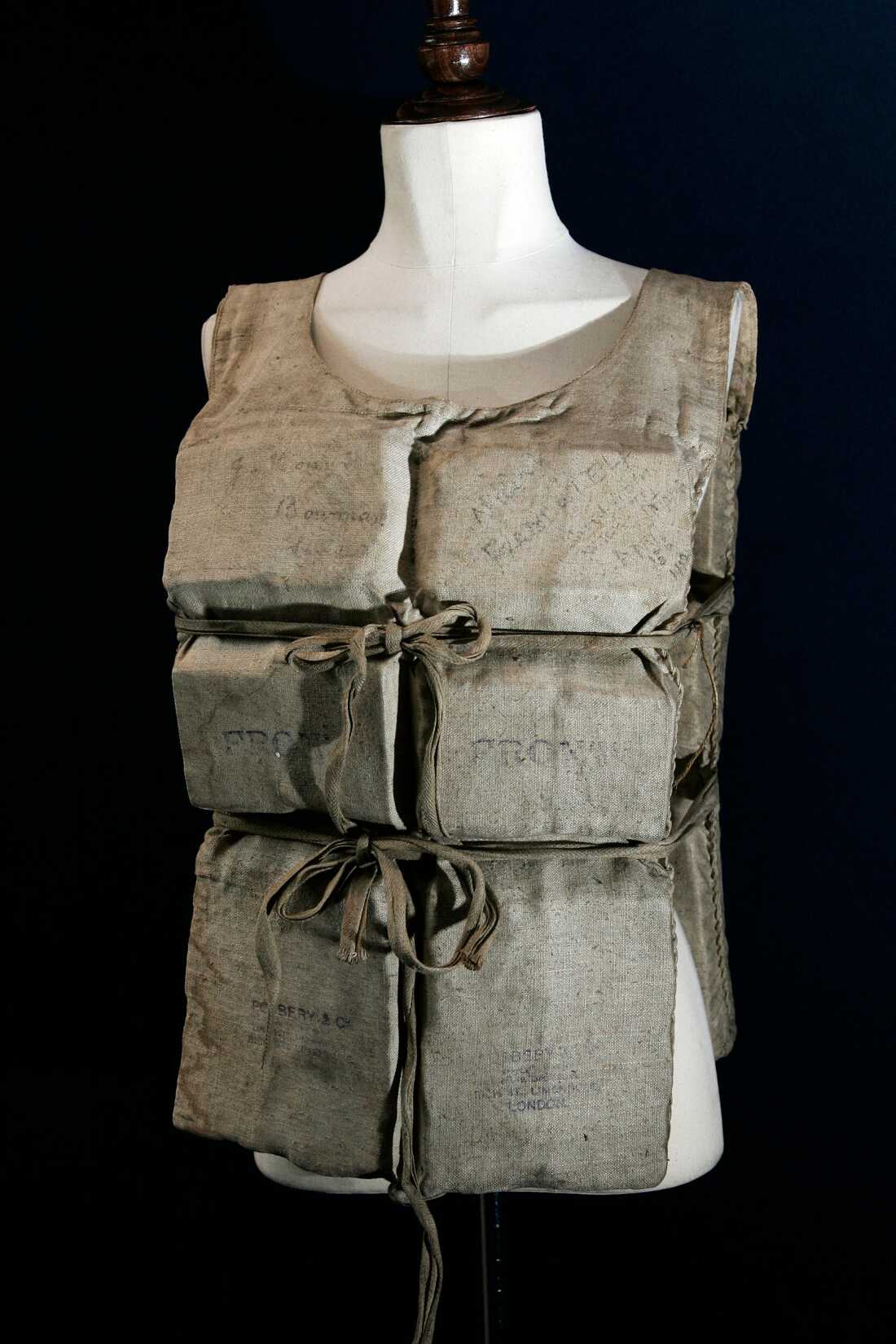 FILE - A Titanic life-preserver, belong to a survivor is shown, London, Wednesday, May 16, 2007.
