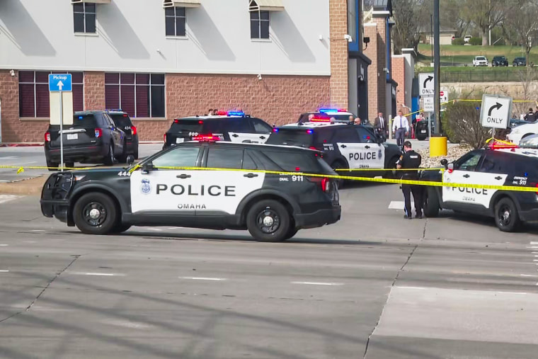 Police cars parked outside of a Walmart