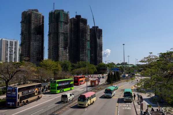 A general view of the fire-ravaged residential towers of the Wang Fuk Court apartment complex, in the Tai Po district of Hong Kong, Feb. 6, 2026. (AP Photo/Chan Long Hei, File)